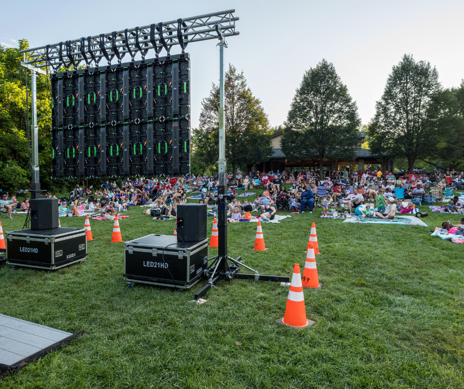  A look from behind the big screen at the crowd for cinema under the stars