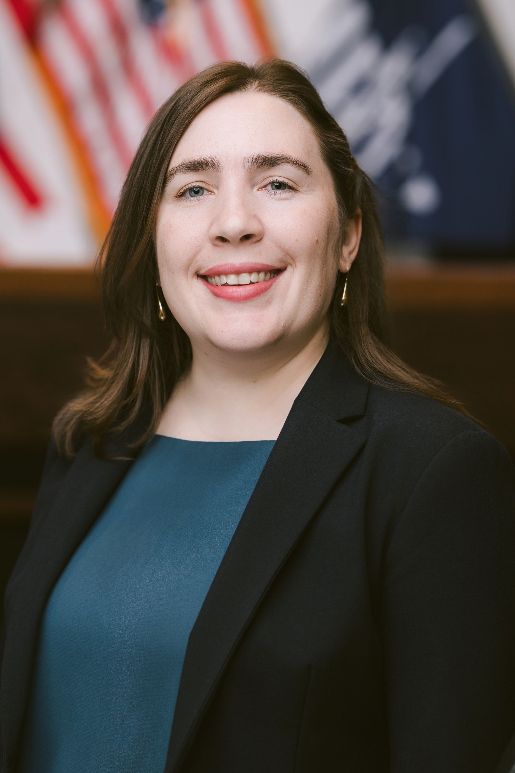 Woman smiles at camera.